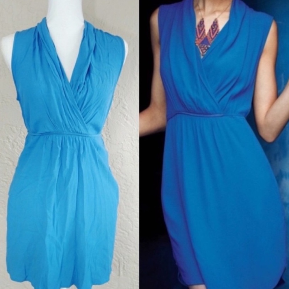 Blue Anthropologie surplice tie bow back dress 4 Small